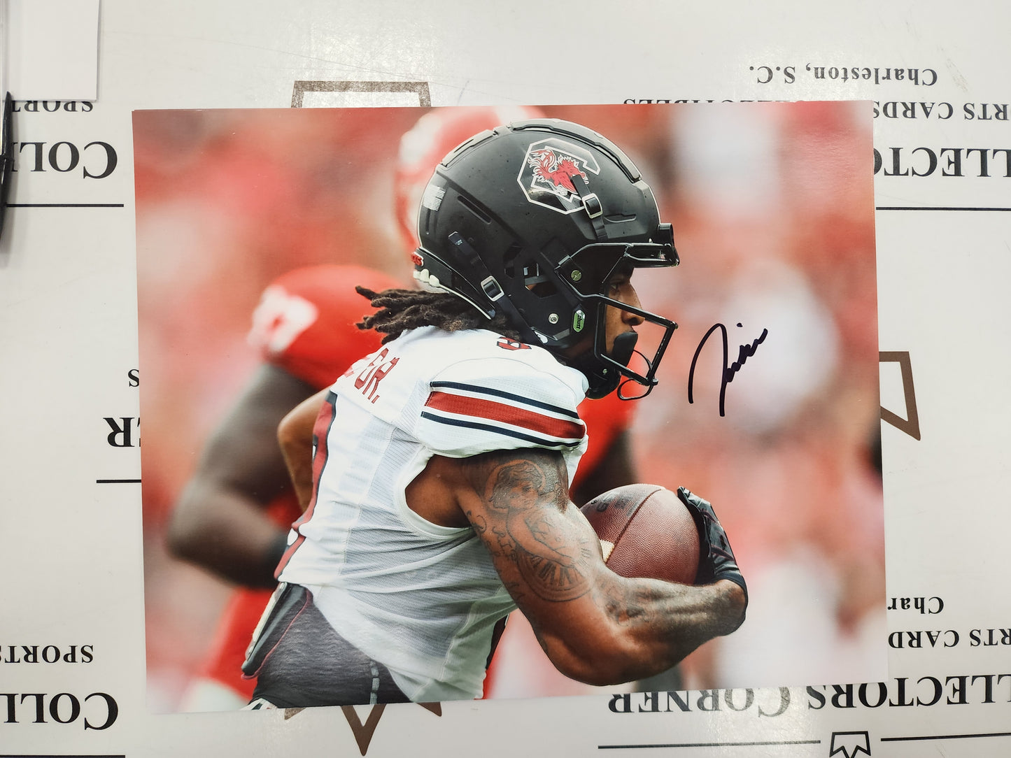 Juice Wells Signed Action Photo vs UGA